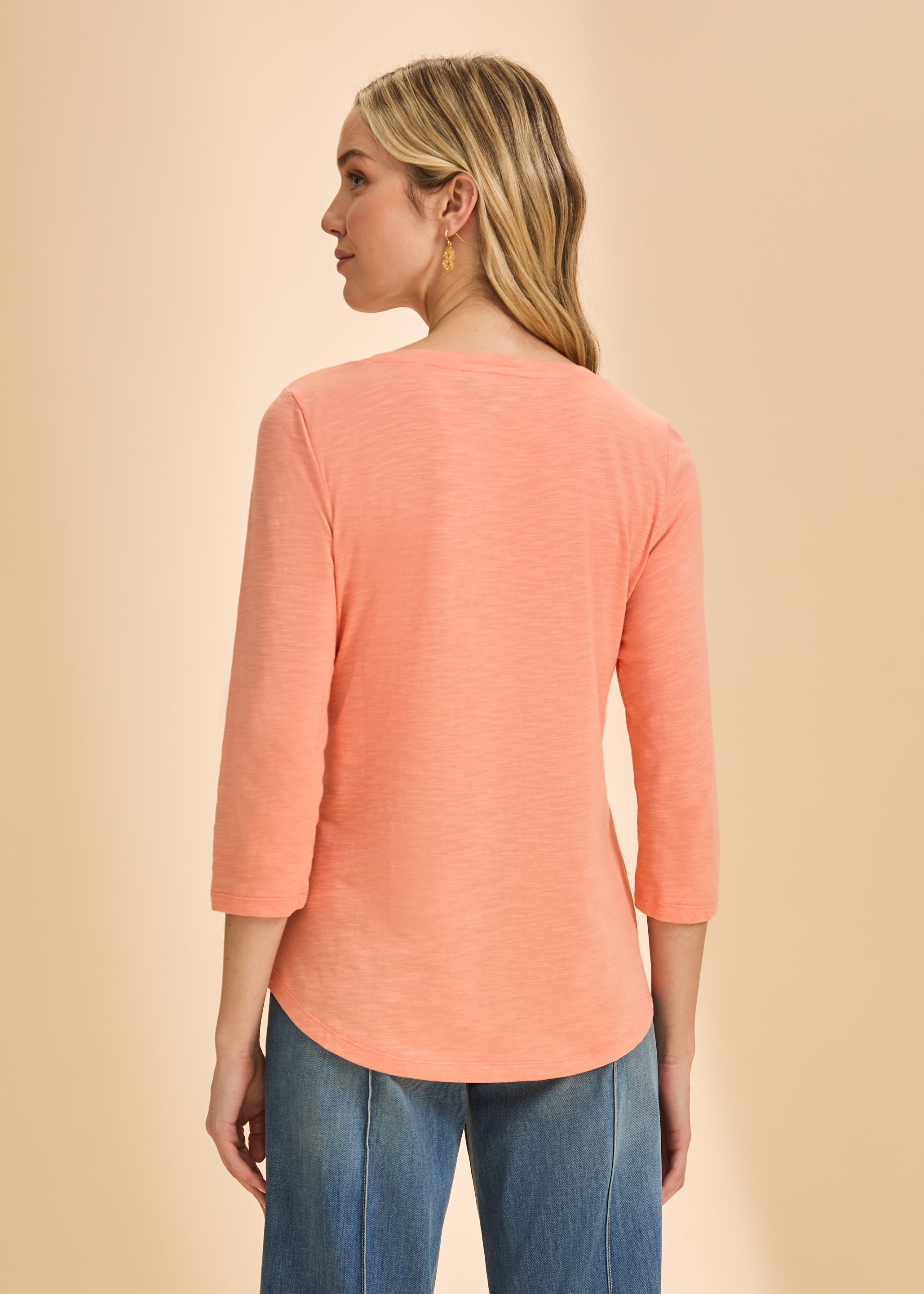 Back view of coral V-neck 3/4 sleeve top showing relaxed fit and smooth fabric by French Dressing Jeans (FDJ)