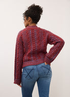 Back view of maroon cabled sweater featuring ribbed trim and knit design by French Dressing Jeans (FDJ)