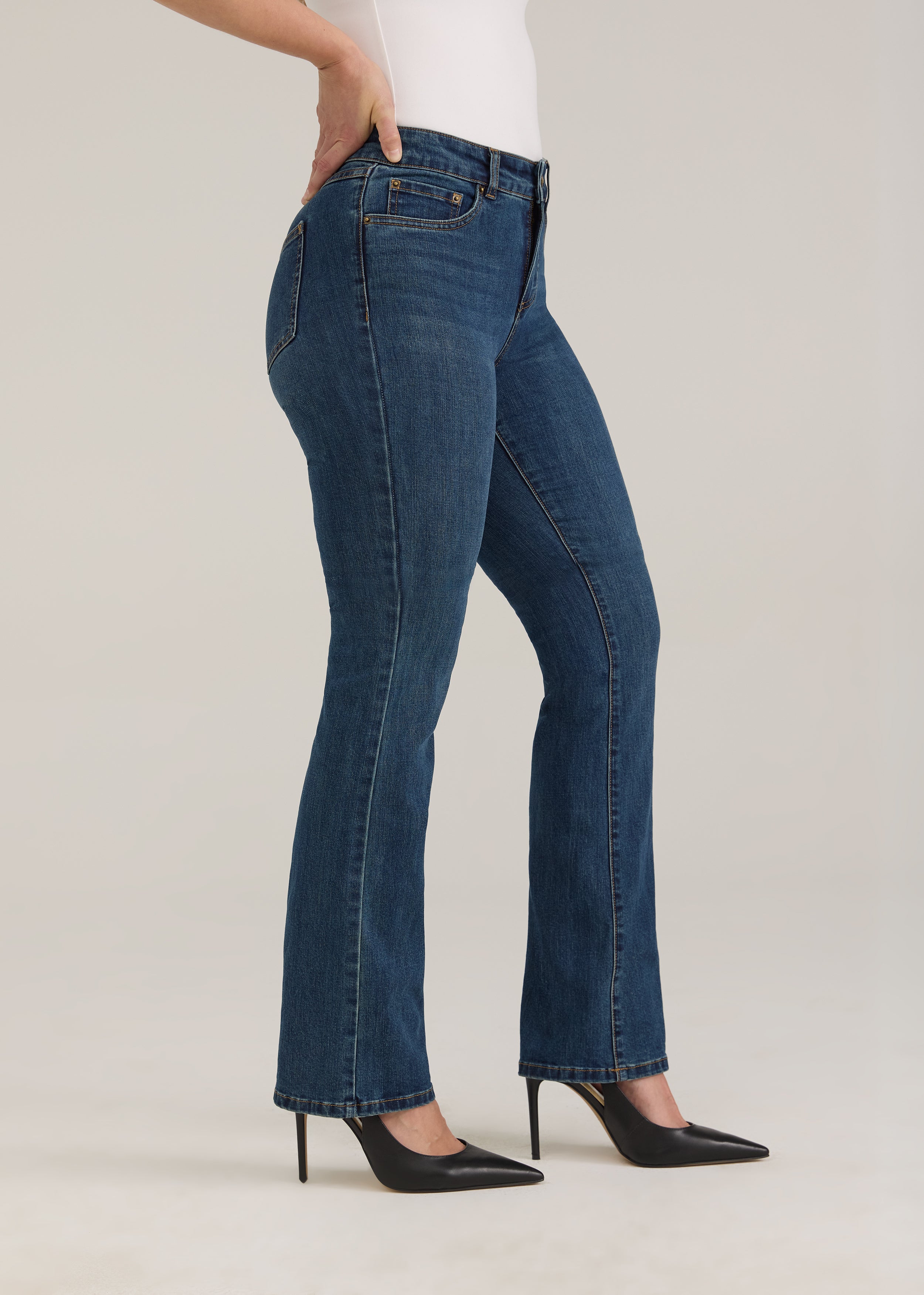 Side view of dark wash jeans highlighting the fit and straight silhouette by French Dressing Jeans (FDJ)