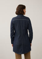 Back view of dark wash long denim tunic showing yoke and sleeve details by French Dressing Jeans (FDJ)