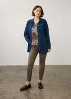 Full outfit view of dark rinse long button-down jacket paired with printed tee by French Dressing Jeans (FDJ)