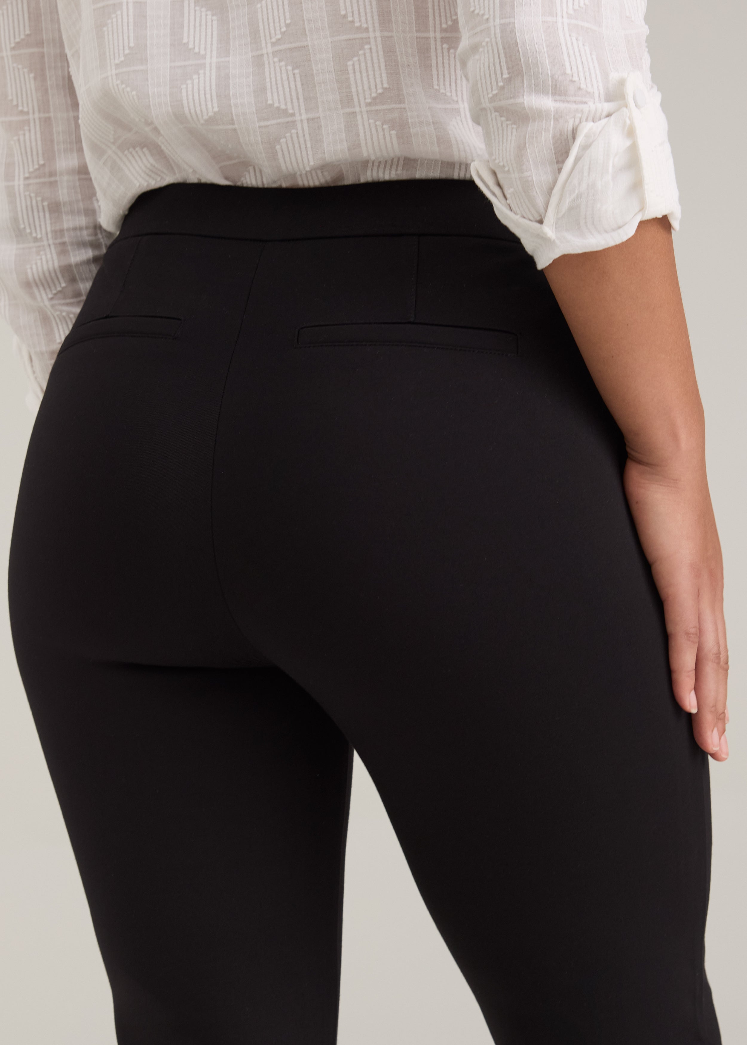 Close-up of fake back welt pockets on black Ponte pants showing fabric texture by French Dressing Jeans (FDJ)