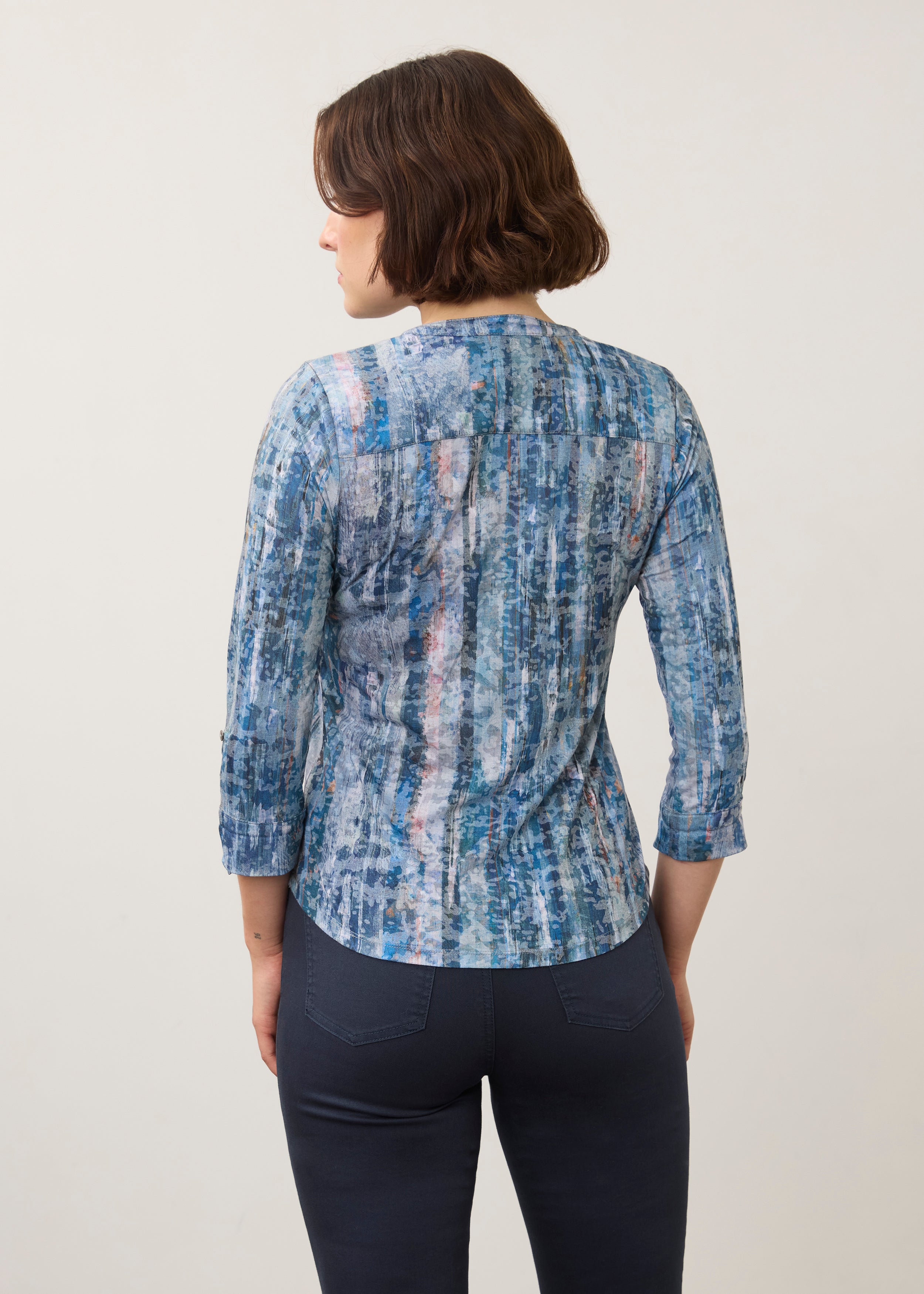 Back view of blue patterned 3/4 sleeve top showing seamless design by French Dressing Jeans (FDJ)