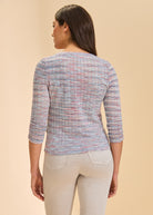 Back view of multicolor V-neck sweater highlighting textured pattern by French Dressing Jeans (FDJ)