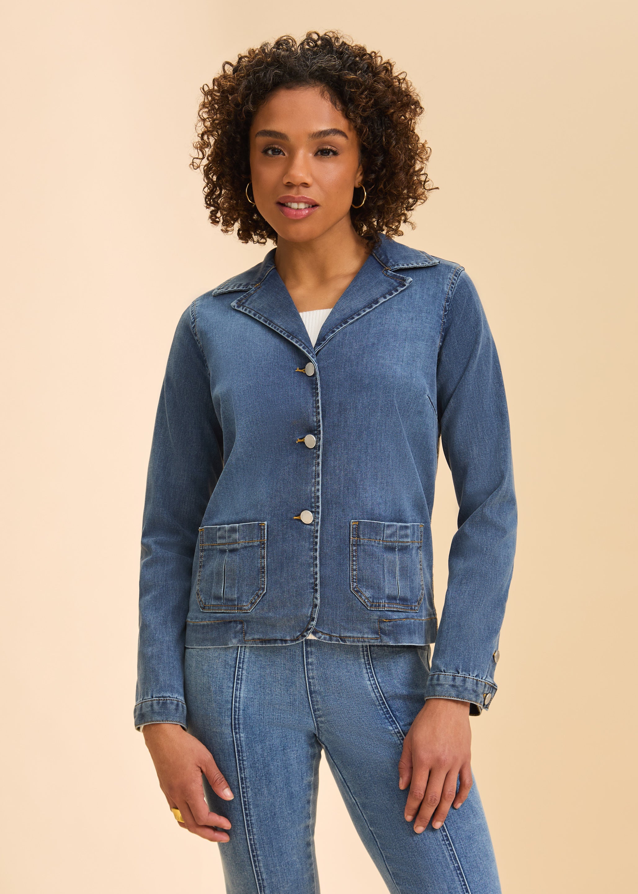 Front view of women's medium wash denim blazer jacket with patch pockets by French Dressing Jeans (FDJ)