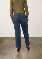 Back view of medium blue wide-leg denim with patch pockets and seam detail by French Dressing Jeans (FDJ)