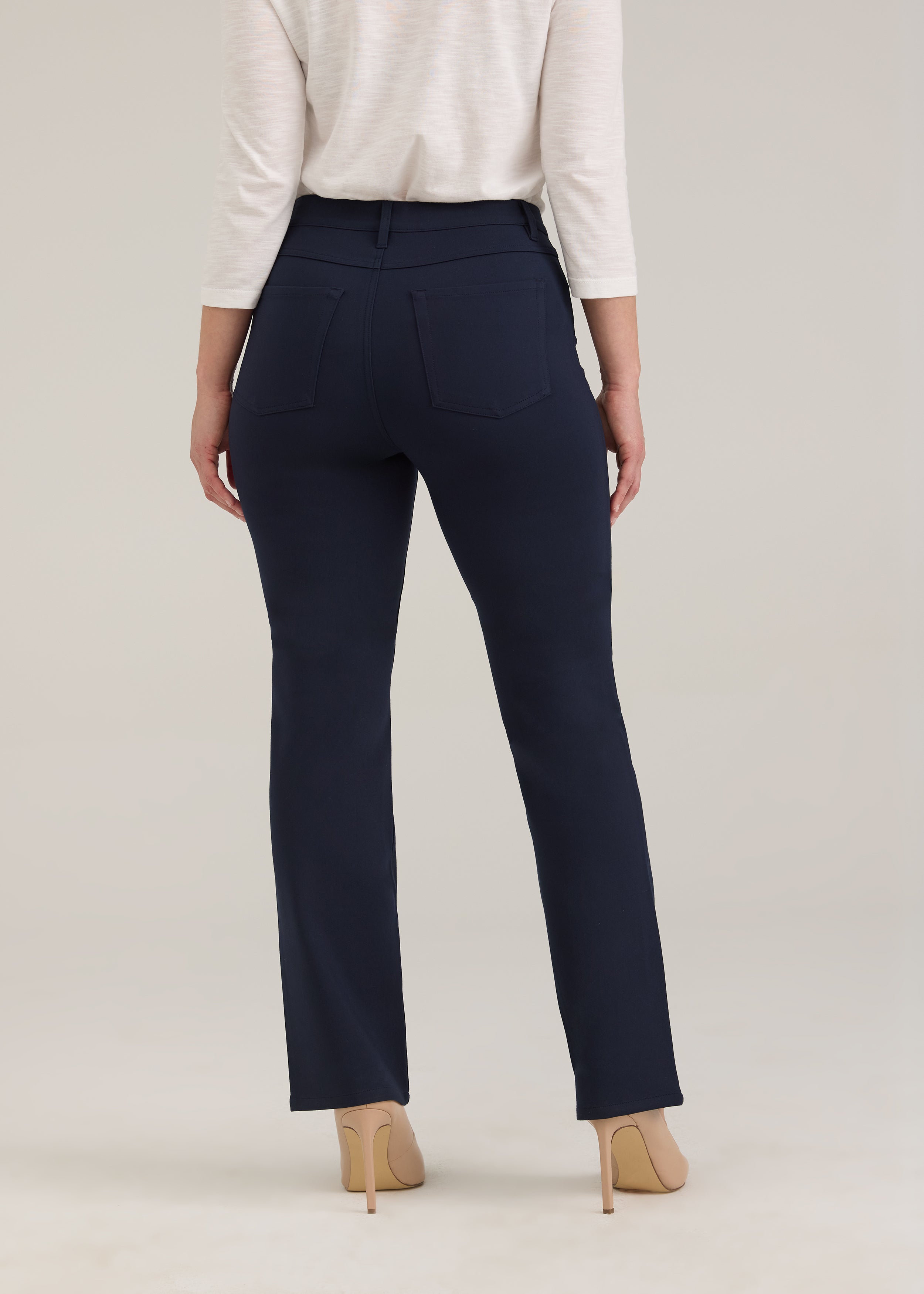 Back view of navy pants with patch pockets and tailored fit by French Dressing Jeans (FDJ)