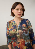 Close-up of multicolor Henley top highlighting button-front and abstract pattern by French Dressing Jeans (FDJ)