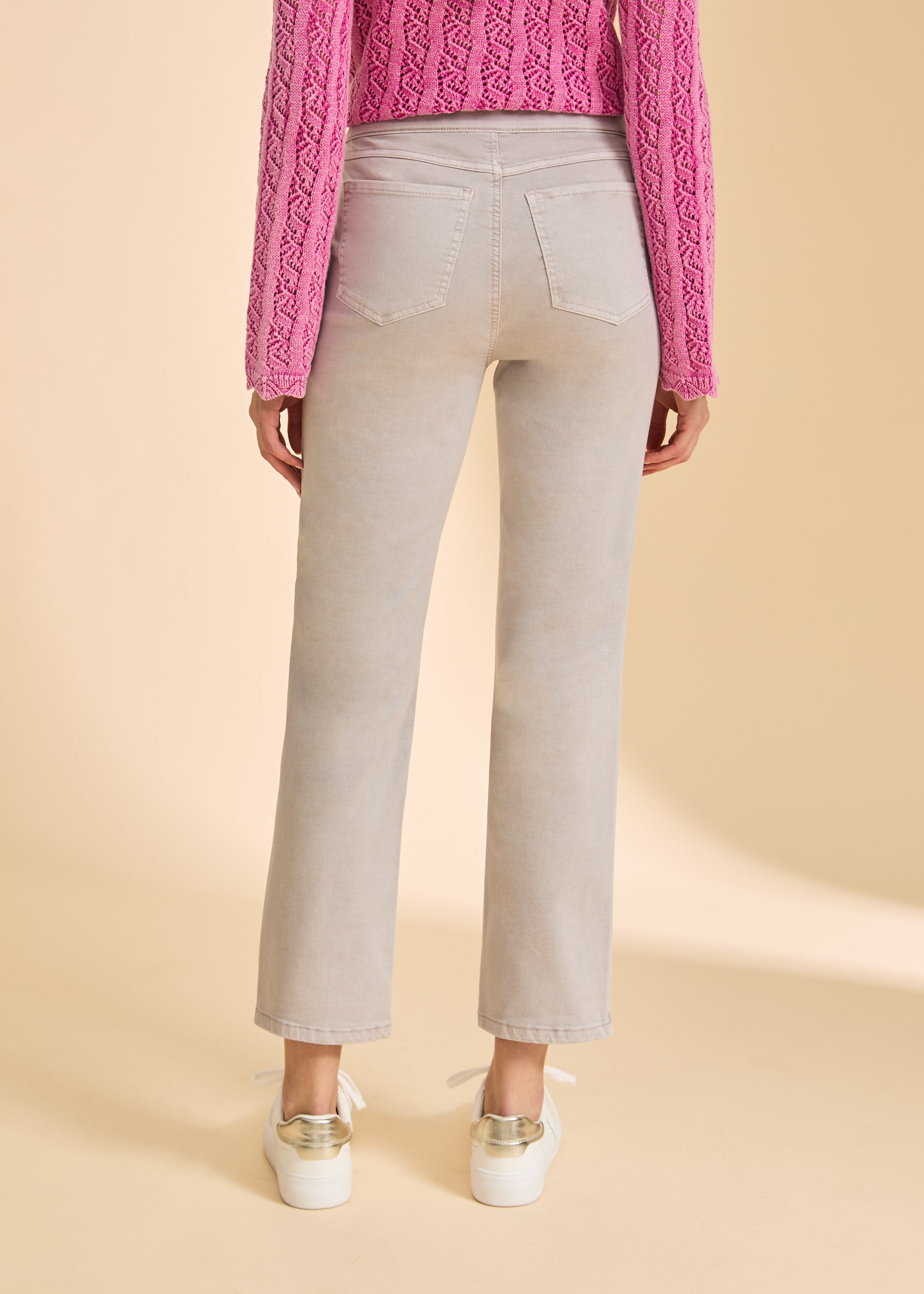 Back view of taupe straight-leg jeans, featuring classic pocket design by French Dressing Jeans (FDJ)