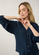 Close-up of navy blouse focusing on colorful buttons by French Dressing Jeans (FDJ)