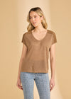 Front view of brown V-neck top with crochet shoulder details paired with jeans by French Dressing Jeans (FDJ)