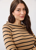 Close-up of striped tan and black sweater highlighting neckline by French Dressing Jeans (FDJ)