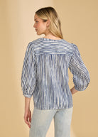 Back view of navy striped blouse with gathered yoke and 3/4 sleeves by French Dressing Jeans (FDJ)