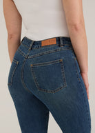 Detail of FDJ label and back pocket stitching on dark wash jeans by French Dressing Jeans (FDJ)