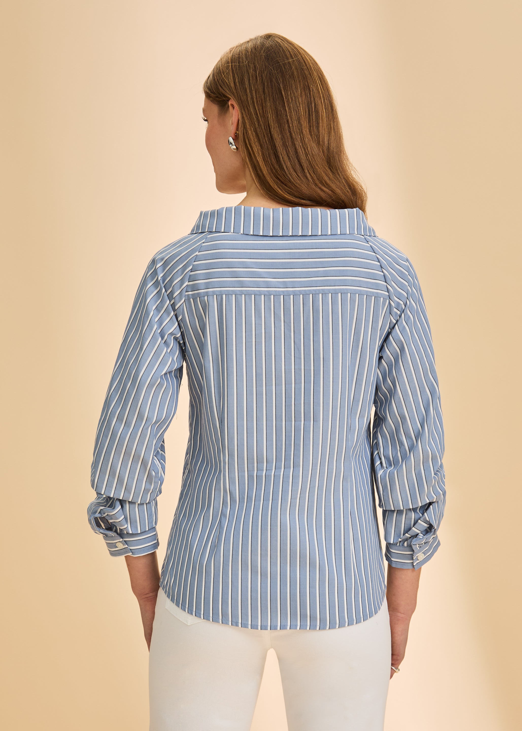 Back view of blue striped shirt displaying collar and cuff detail by French Dressing Jeans (FDJ)