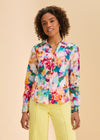 Front view of vibrant floral split neck shirt with button front by French Dressing Jeans (FDJ)