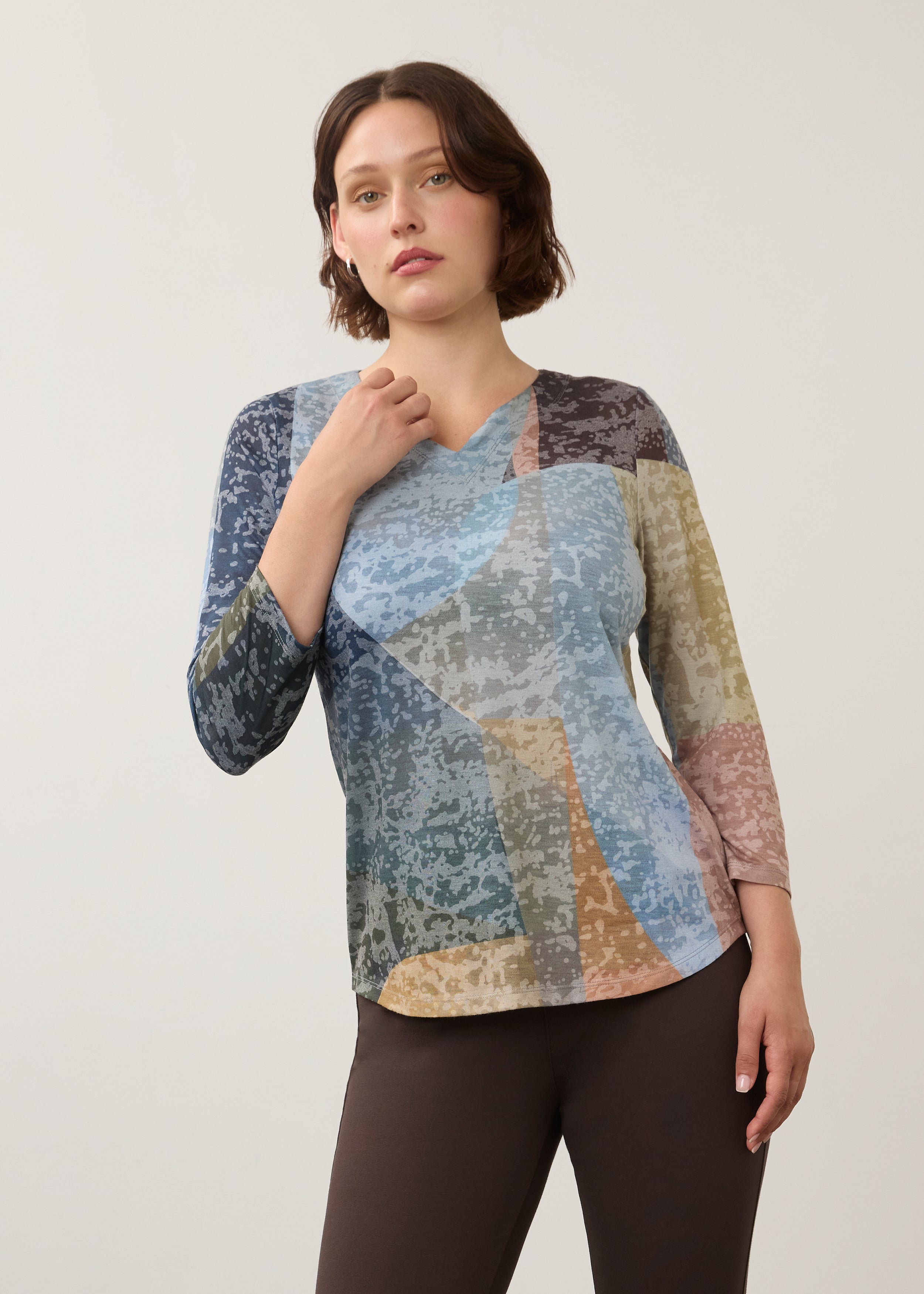 Front view of 3/4 sleeve notch neck top in Warn color with abstract pattern by French Dressing Jeans (FDJ)