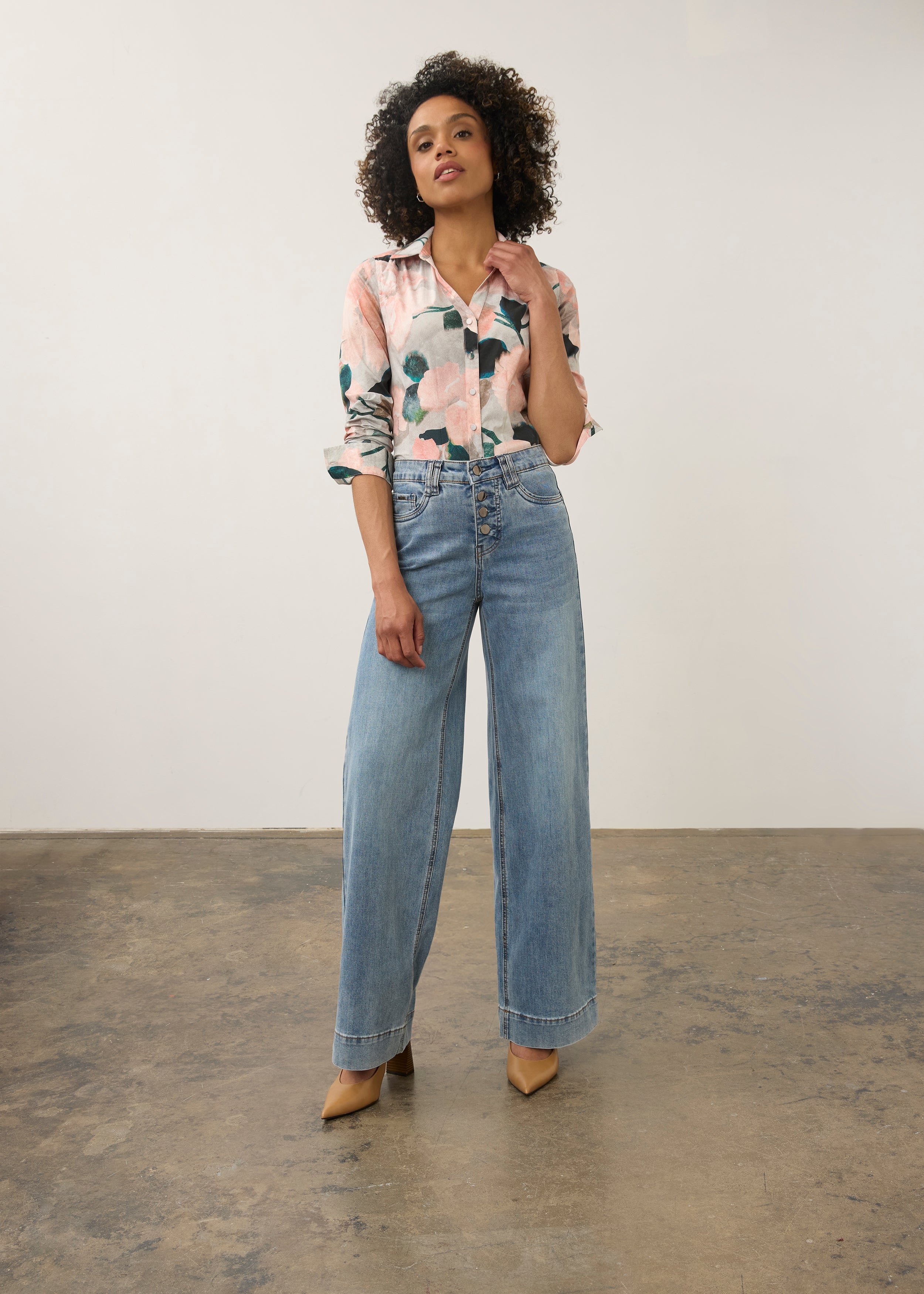 Model in pink floral shirt and denim pants, full body view by French Dressing Jeans (FDJ)