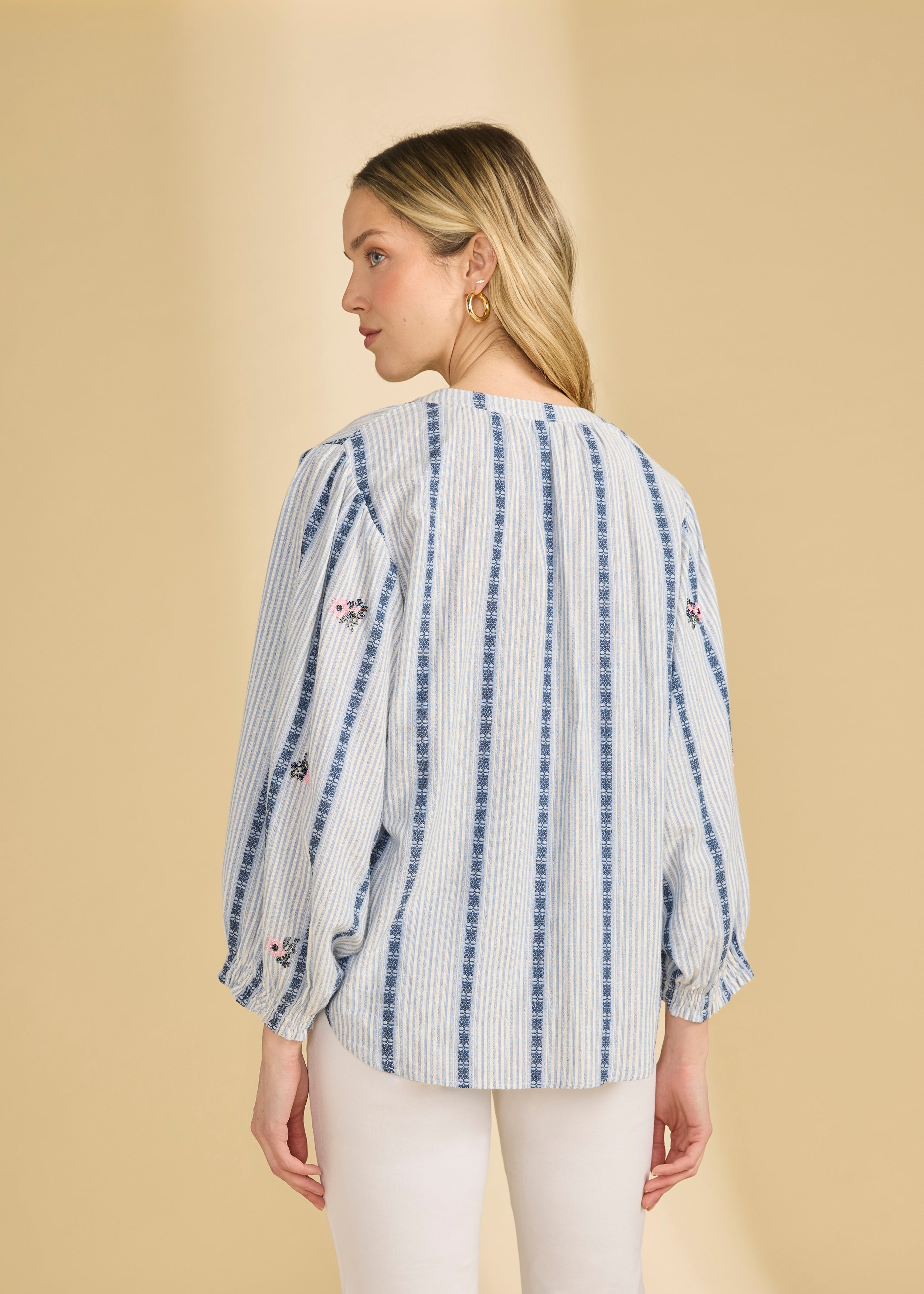 Back view of striped shirt with floral accents and long sleeves indoors by French Dressing Jeans (FDJ)