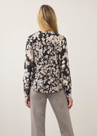 Back view of floral printed shirt showcasing long sleeves by French Dressing Jeans (FDJ)