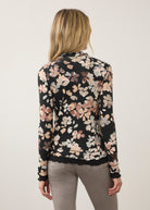 Back view of floral black top, highlighting seamless design and scalloped edges by French Dressing Jeans (FDJ)