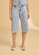 Front view of powder wash denim shorts with scalloped hem and pleats by French Dressing Jeans (FDJ)
