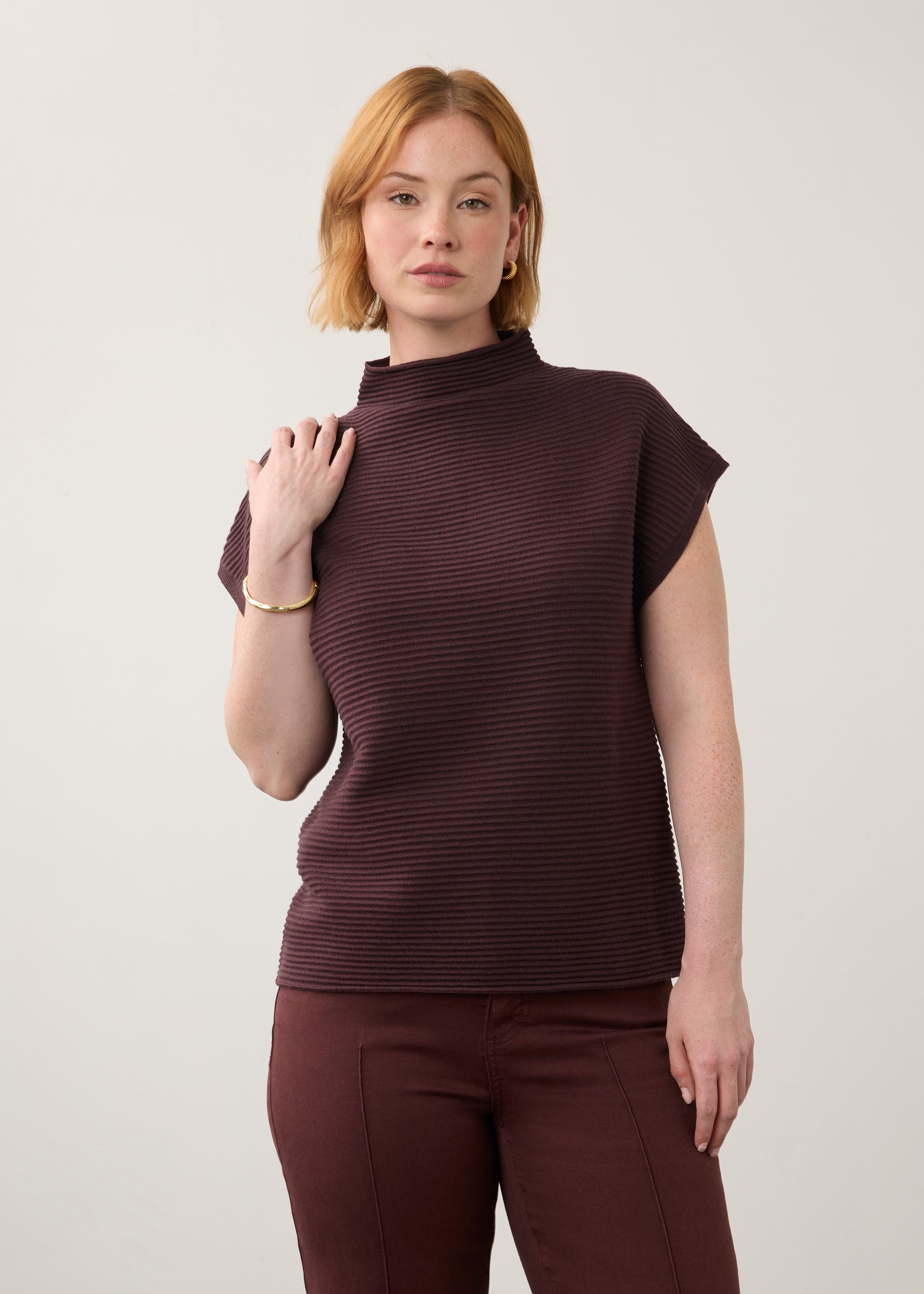 Front view of burgundy short sleeve top with ribbed texture and high collar by French Dressing Jeans (FDJ)