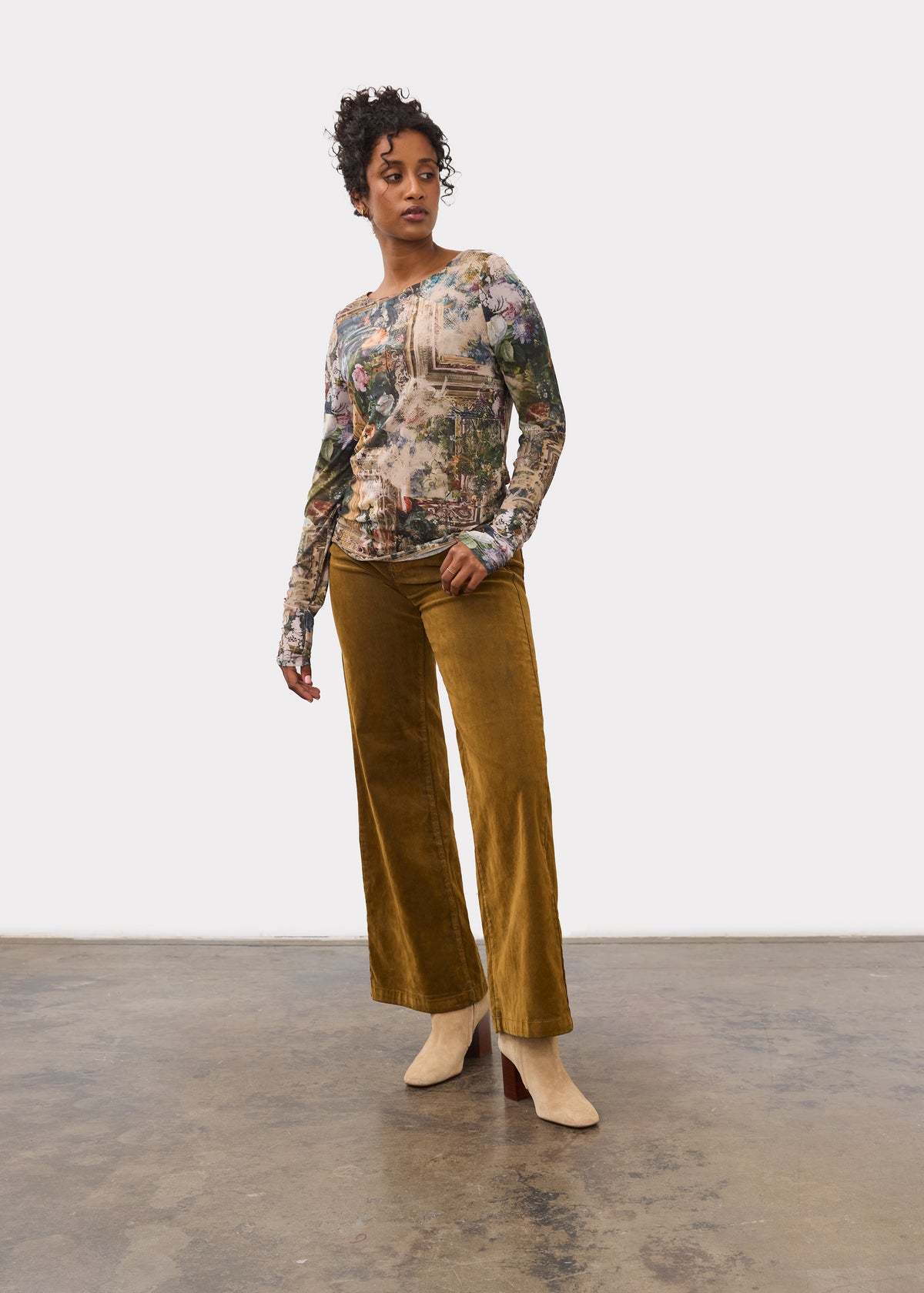Model wearing brass Olivia wide leg denim in a stylish pose by French Dressing Jeans (FDJ)
