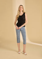 Full view of black crochet tank styled with mid-blue jeans by French Dressing Jeans (FDJ)