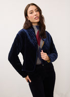 Close-up of blueberry quilted jacket highlighting diagonal stitching and velvet texture by French Dressing Jeans (FDJ)